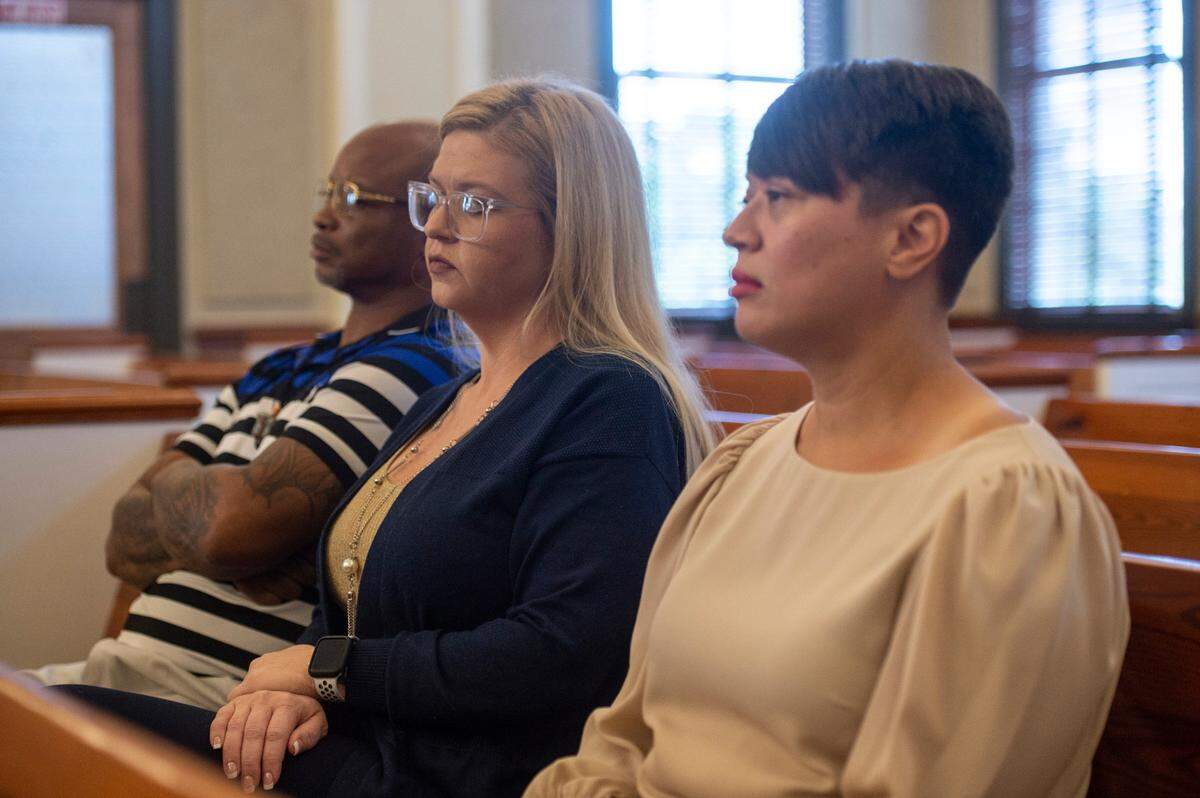 Ben Taylor’s ex-girlfriend Branissa Stroud, center, and Taylor’s wife Dorean Taylor, right, sit in on a court hearing for Taylor’s case against DHS at Hancock County Chancery Court in Bay St. Louis on Monday, Sept. 12, 2022. Taylor failed to show up for court.