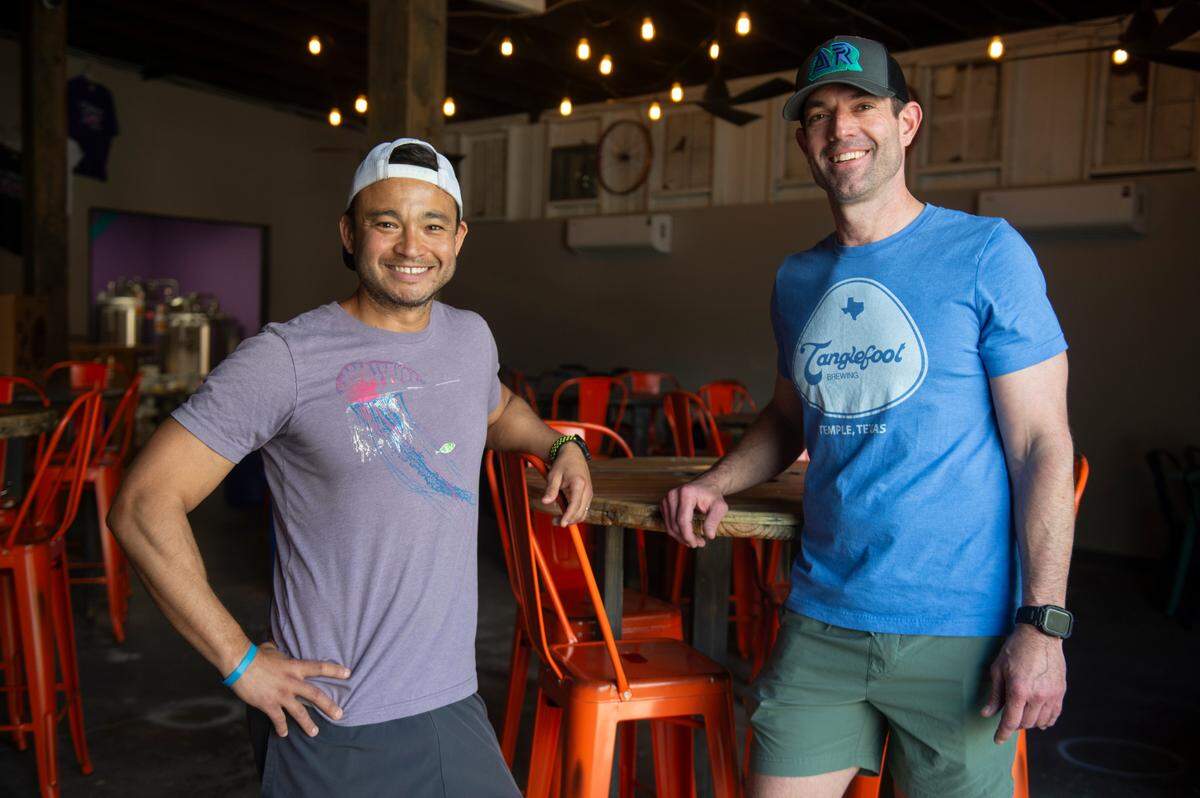 Altered Reality co-owners Mike Massey, right, and Jason Weaver pose for a portrait inside the future brewery on Howard Avenue in Biloxi on Friday, Feb. 23, 2024.