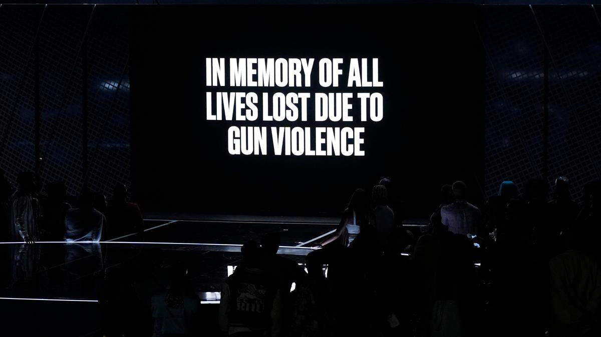 A tribute to those lost to gun violence appears on screen at the BET Awards on Sunday, June 26, 2022, at the Microsoft Theater in Los Angeles. (AP Photo/Chris Pizzello)