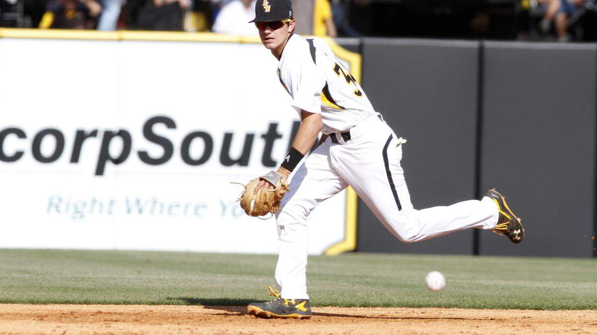 TIM ISBELL/SUN HERALDSouthern Miss second baseman Storme Cooper tries to run down a ground ball against Rice, Saturday, Apr. 23, 2016. 