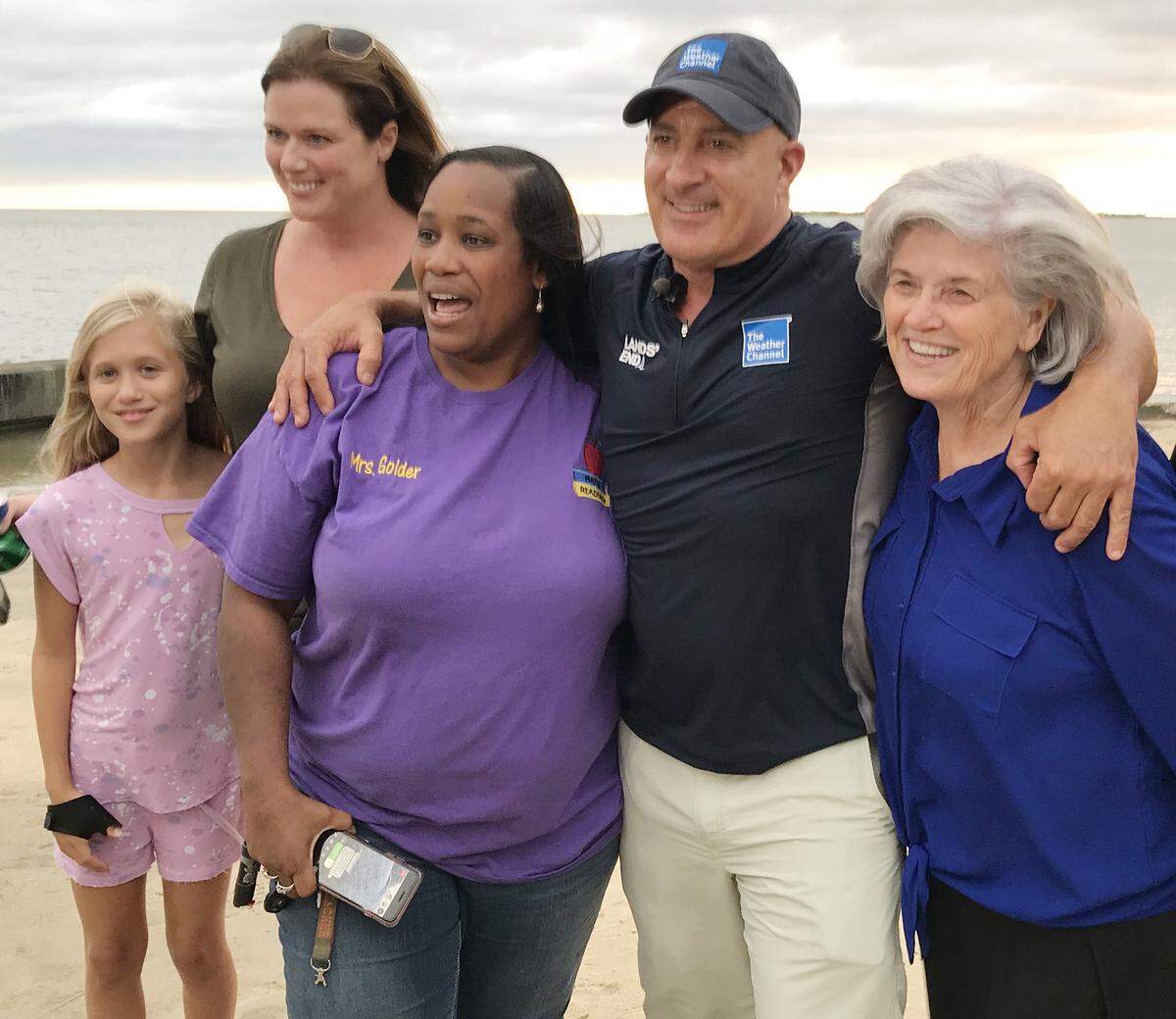 The Weather Channel’s Jim Cantore poses with fans on Tuesday, Sept. 4, 2018 between live shots from the beach in Pascagoula where he was reporting Tropical Storm Grodon.