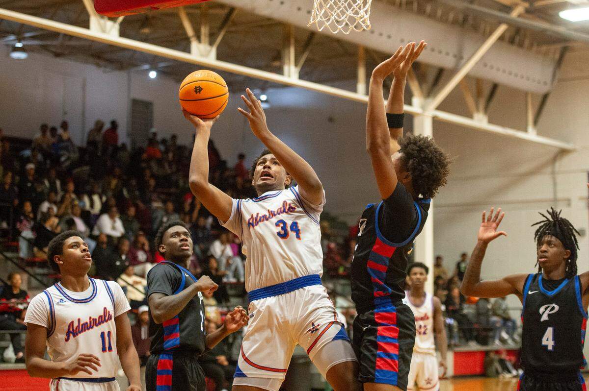 Gulfport’s Travor Frost shoots the ball during a game between Pascagoula and Gulfport at Harrison Central High School on Saturday, Jan. 25, 2025.