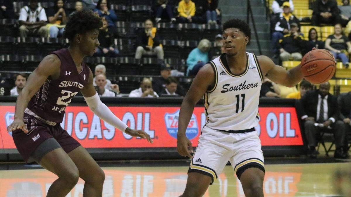 Southern Miss guard LaDavius Draine looks to pass against Southern Illinois on Saturday, Dec. 7, 2019, at Reed Green Coliseum in Hattiesburg.