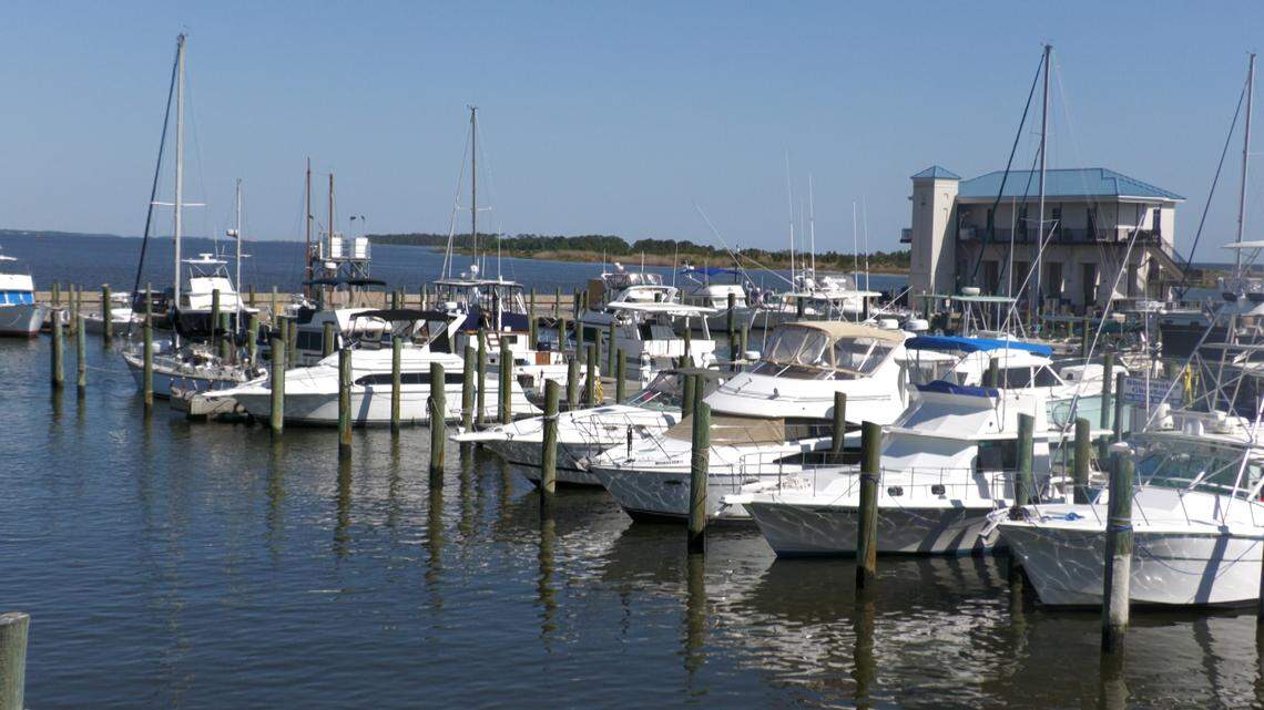Boats line the docks at a Biloxi marina, where tourism-driven businesses rely on summer visitors to keep the local economy afloat. From fishing charters to sightseeing cruises, the waterfront serves as a hub for coastal recreation.