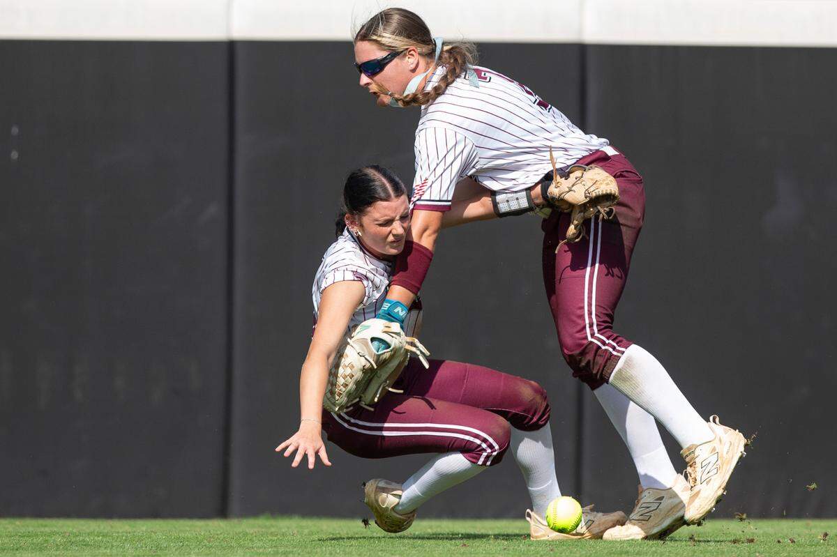 East Central’s Chloe Sheppard and Elizabeth Kennedy collide during the MHSAA 5A Softball Championship at USM Softball Complex in Hattiesburg on Wednesday, May 14, 2025.