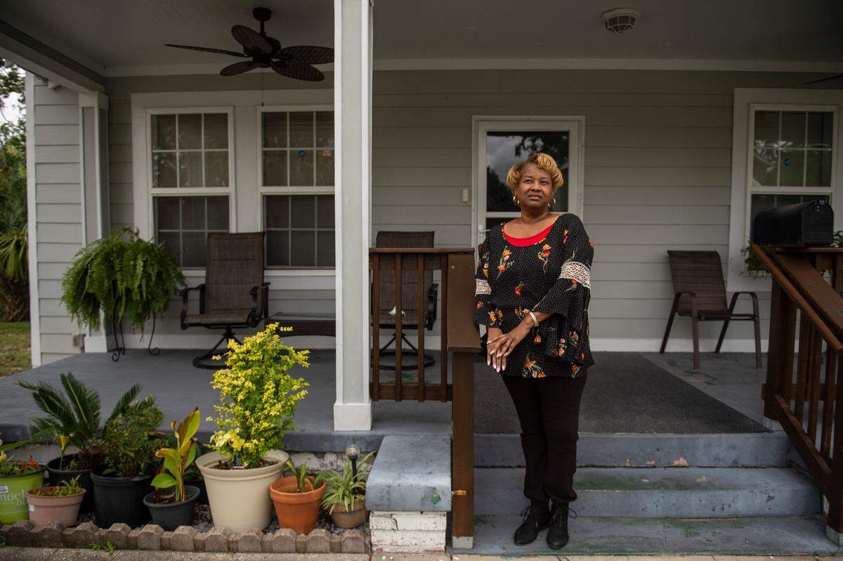 Karen Fleeton poses for a portrait outside her home in East Biloxi on Friday, Oct. 29, 2021.