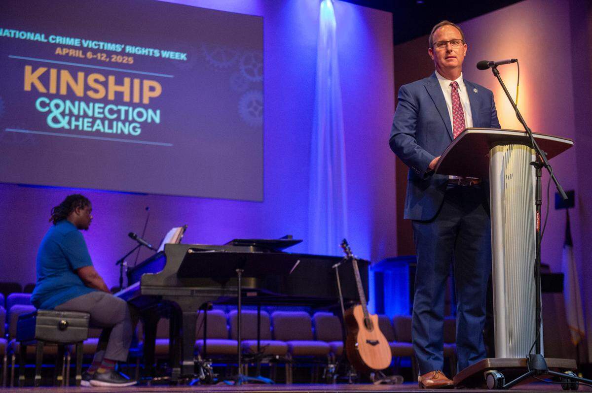District Attorney W. Crosby Parker speaks during a coast-wide candlelight ceremony as a part of National Crime Victims’ Rights Week at First Baptist Church of Gulfport on Tuesday, April 29, 2025.