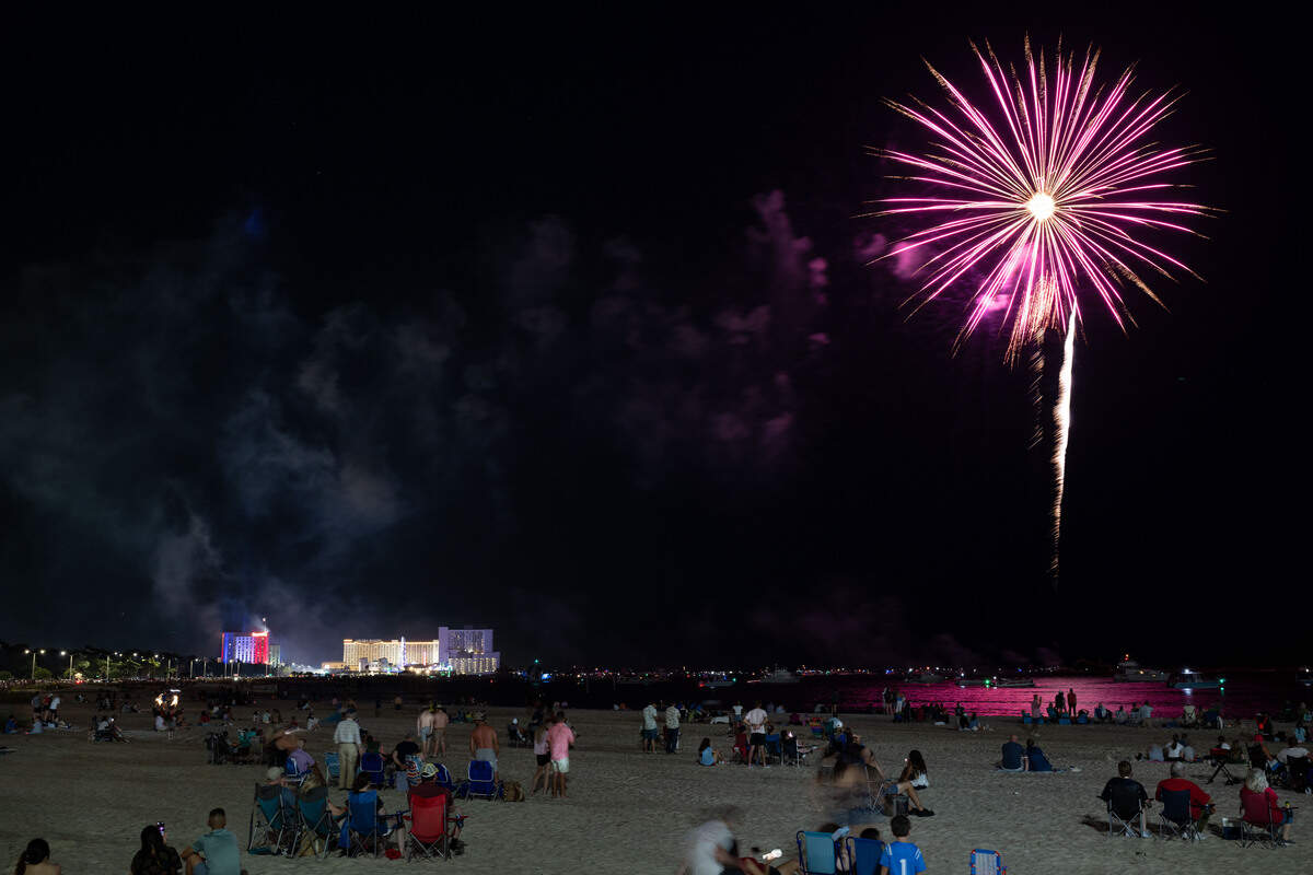 Fireworks are shot into the air during the annual show over the Mississippi Sound on Saturday, July 4, 2026.