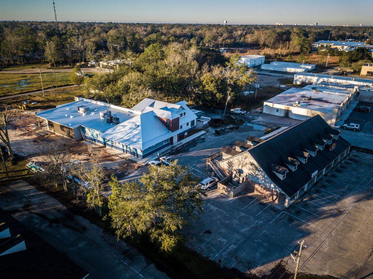 An aerial view of Woody’s Roadside restaurant in Ocean Springs shows the existing restaurant to the right and the new restaurant that is expected to replace it this spring.