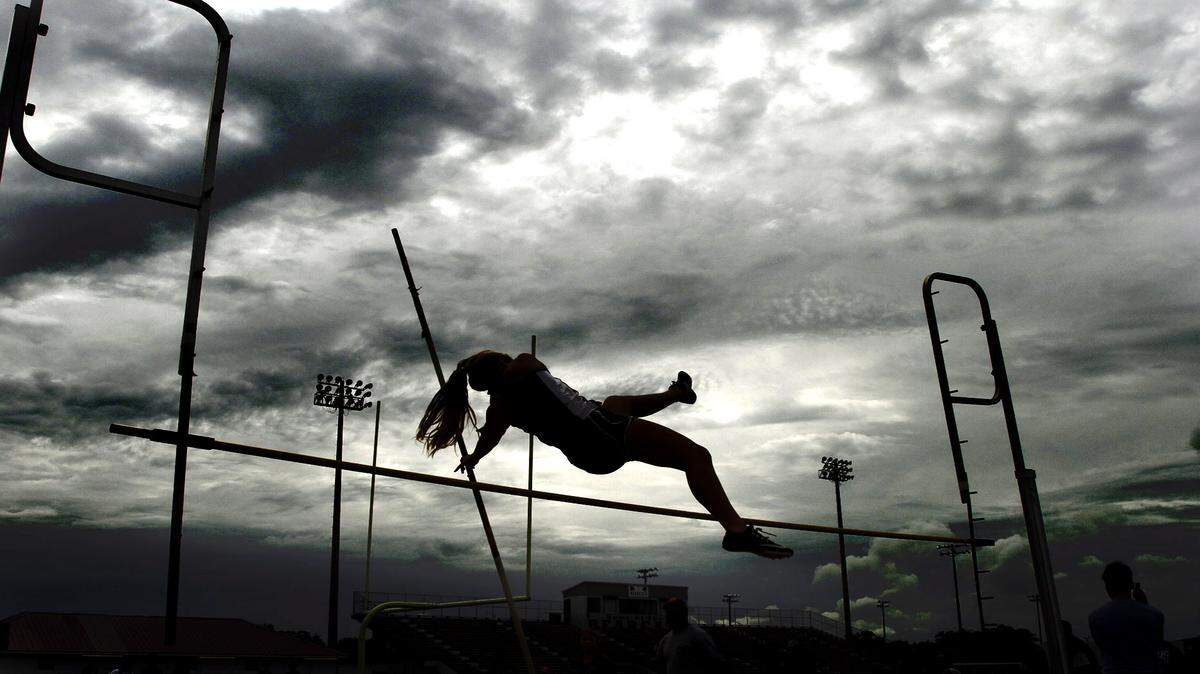 TIM ISBELL/SUN HERALD 
 Samantha Steele of Long Beach jumps in pole vault competition during Region 4-5A track and field championship, Thursday, Apr. 21, 2016.