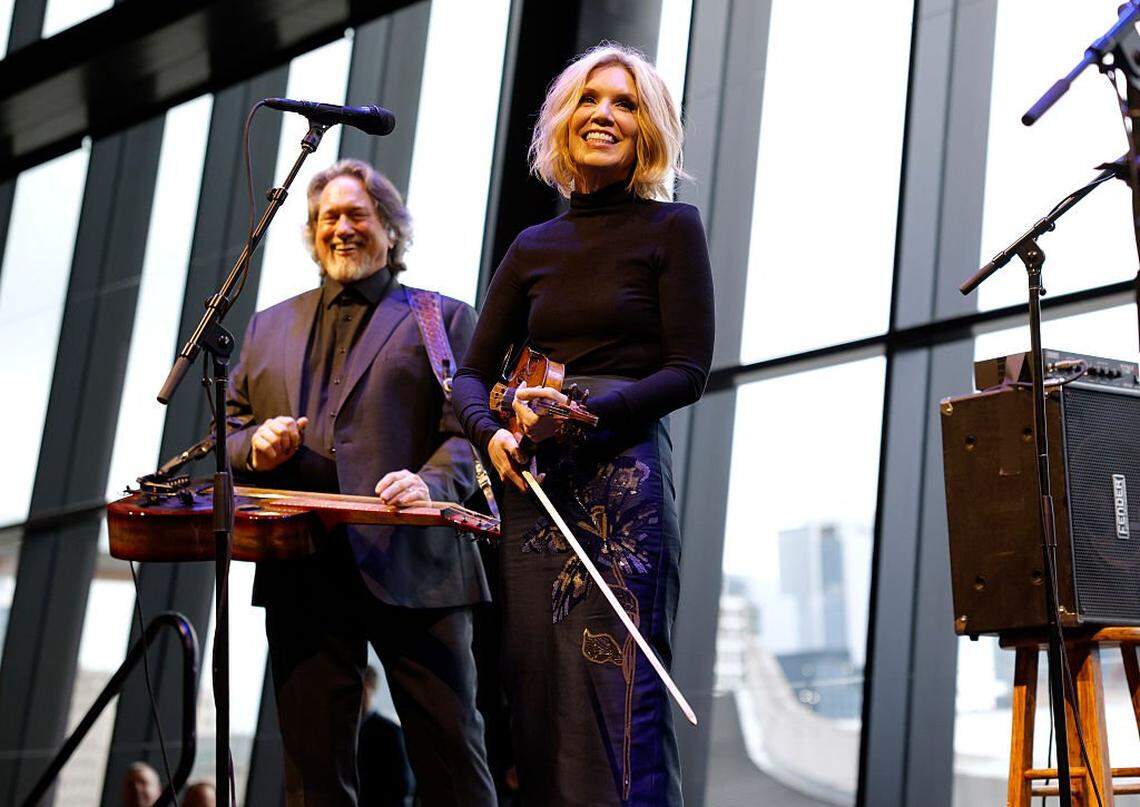Jerry Douglas of Union Station and Alison Krauss perform onstage at the opening of Country Music Hall of Fame.