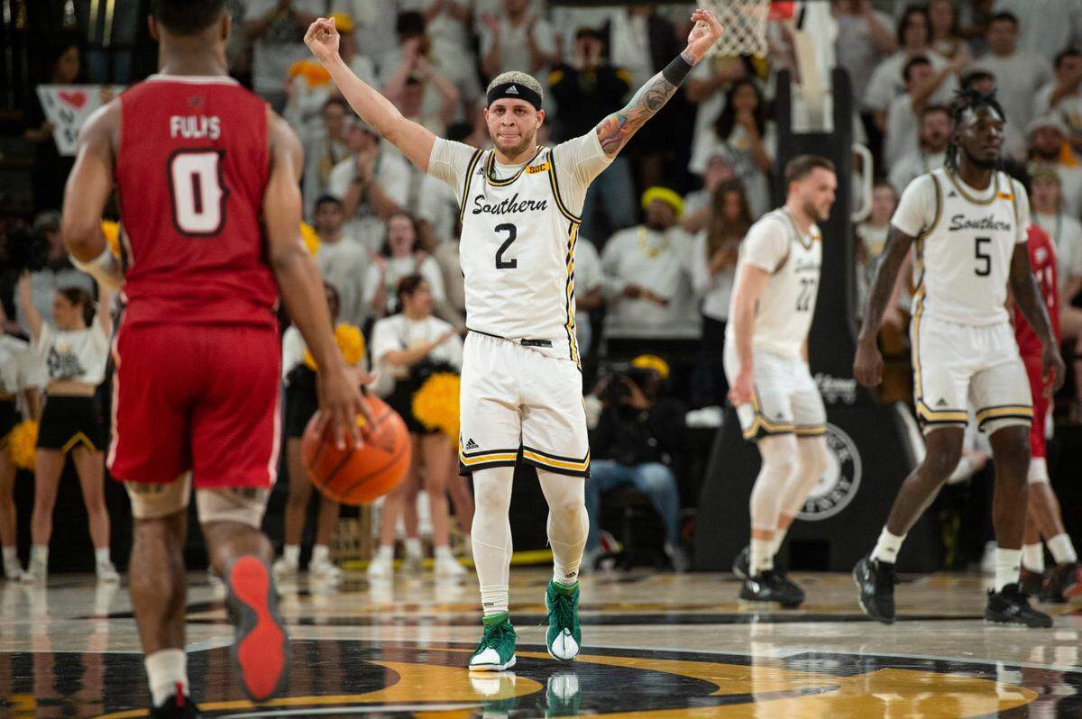 Southern Miss’s Neftali Alvarez hypes up the crowd during a game against Louisiana-Lafayette at Reed Green Coliseum on Thursday, Feb. 9, 2023.