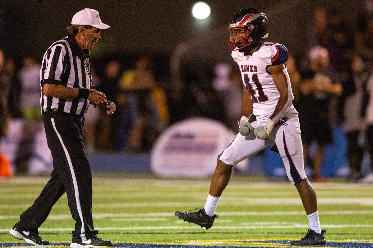 Hancock’s Xavier Ganier celebrates after a play during a game against St. Martin at Joe Barlow Stadium in St. Martin on Friday, Sept. 30, 2022.