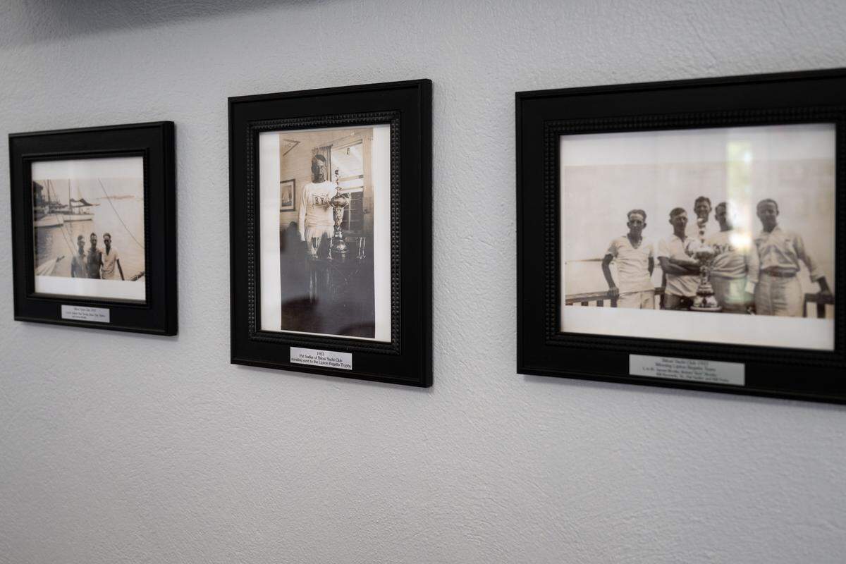 Old photographs of previous members of the Biloxi Yacht Club are displayed in downtown Biloxi.