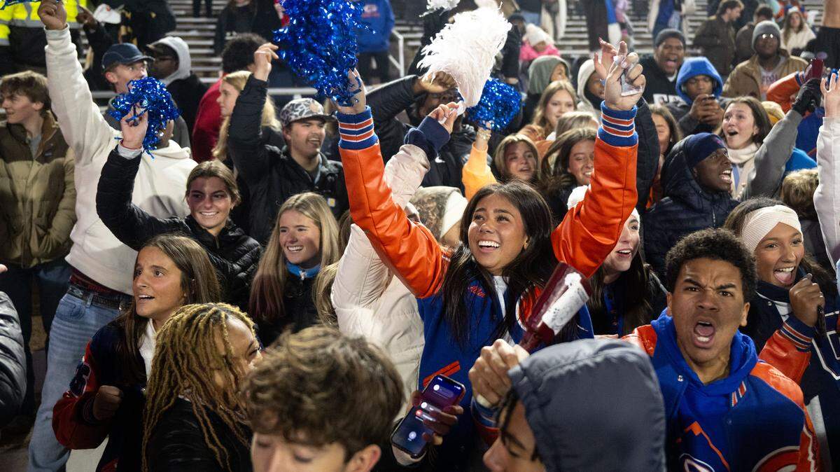 Gulfport fans react to the Hail Mary touchdown pass that won the Class 7A state title game for Gulfport on Saturday.