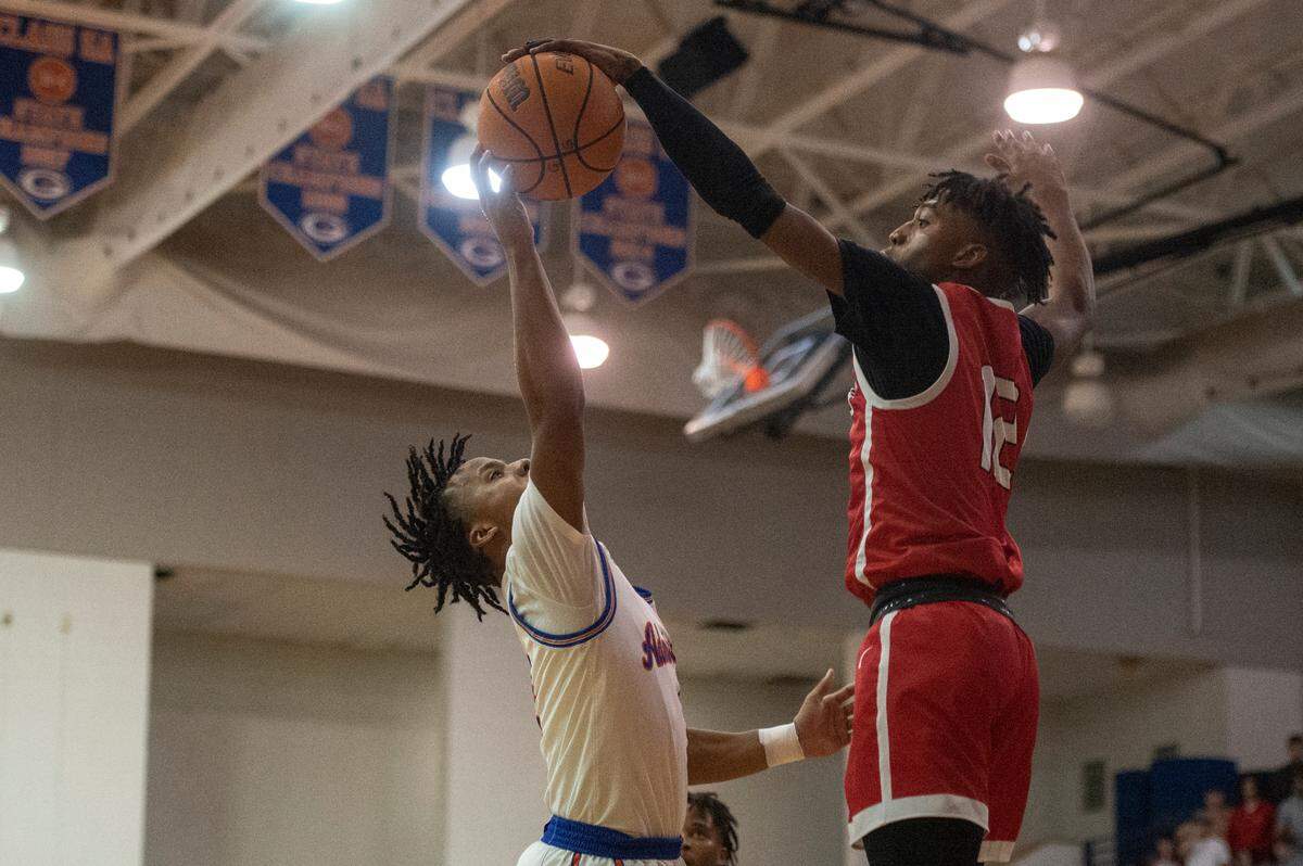 Biloxi’s Duran Parish blocks a shot during a game against Gulfport at Gulfport High School in Gulfport on Friday, Jan. 13, 2023.