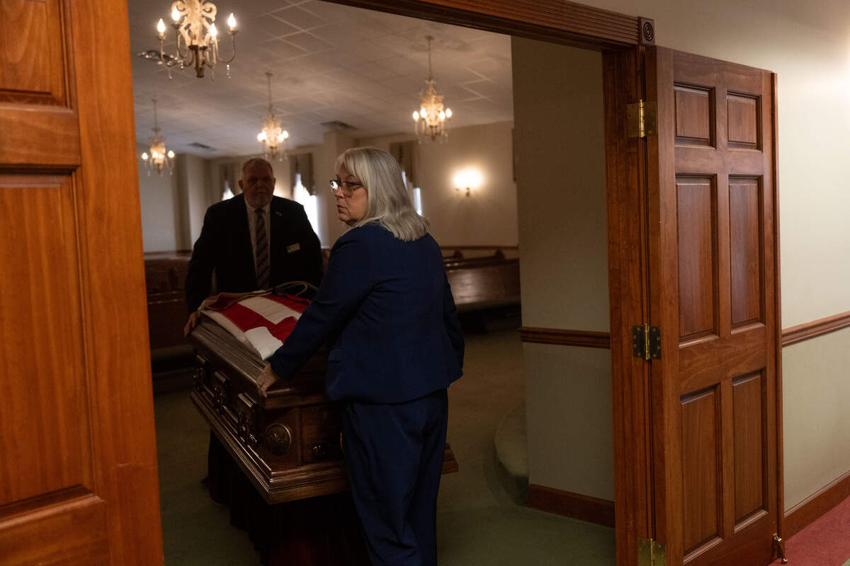 Joshua Brashears’ casket is taken away from Heritage Funeral Home from transport to his gravesite.