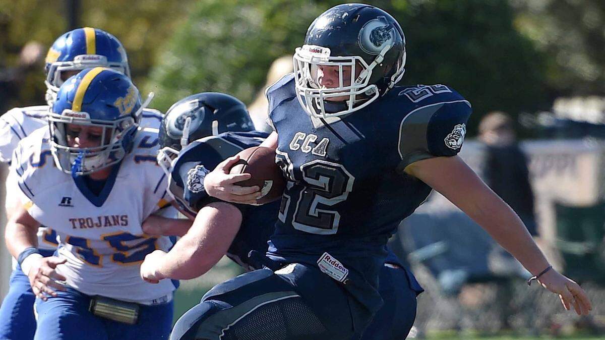T.J. Clolinger (22) scores a fourth quarter touchdown for CCA against Tallulah in the 8-Man title game on Thursday, November 19, 2015, at MAIS State Football Championships at Millsaps College in Jackson, Miss.