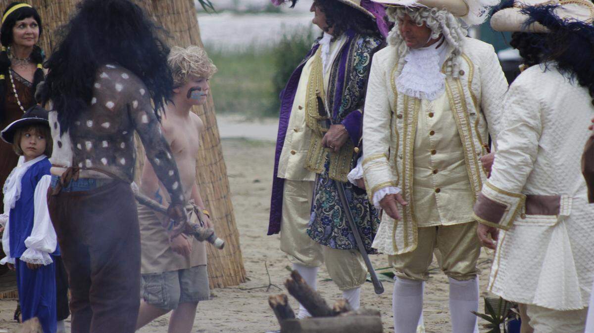 WESLEY MULLER/SUN HERALD 
 Actors portray Native Americans and French explorers, including David Reynolds as Pierre Le Moyne, sieur d'Iberville, second from right, during a reenactment with the 1699 Historical Society in Ocean Springs on Saturday, April 30, 2016.