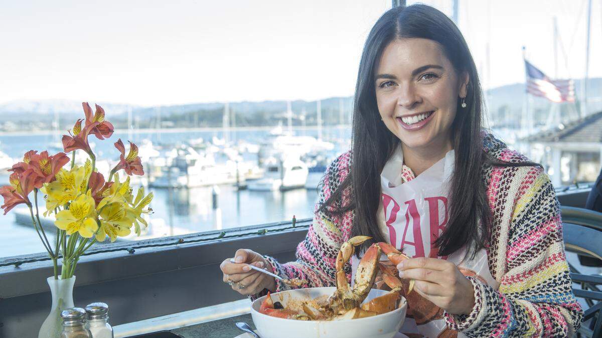 Host Katie Lee enjoys a traditional Cioppino seafood stew at Massaro & Santos seafood restaurant in Monterey, as seen on "Beach Bites with Katie Lee," Season 3. Lee's show will premiere Thursday with the Mississippi Coast as the focal point of the episode.