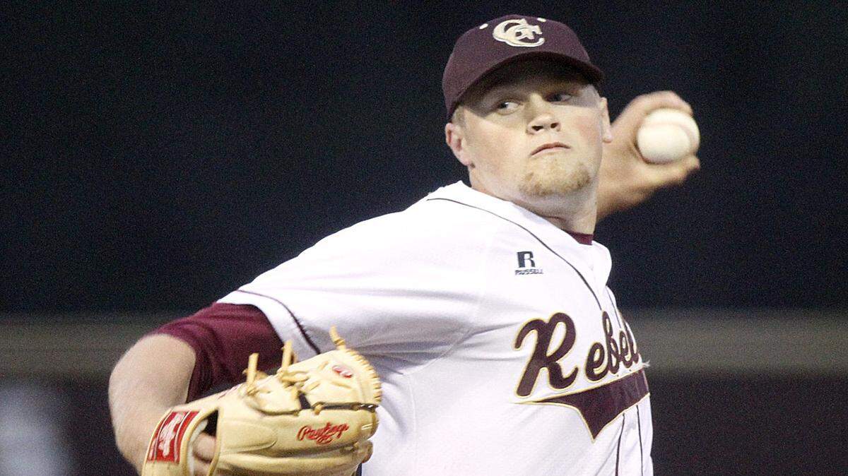 TIM ISBELL/SUN HERALD 
 George County pitcher Walker Robbins fires a pitch against D'Iberville, Friday, Apr. 15, 2016.