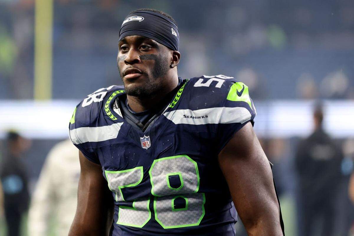 SEATTLE, WASHINGTON - NOVEMBER 24: Derick Hall #58 of the Seattle Seahawks looks on against the Arizona Cardinals at Lumen Field on November 24, 2024 in Seattle, Washington. (Photo by Steph Chambers/Getty Images)