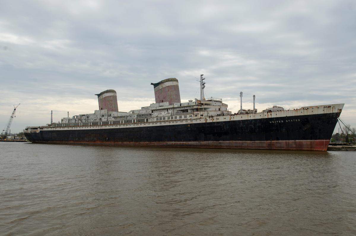 The SS United States docked in Mobile on Friday, March 28, 2025. The ship is being stripped of any hazardous materials before being sunk as an artificial reef off of Destin, Fl.
