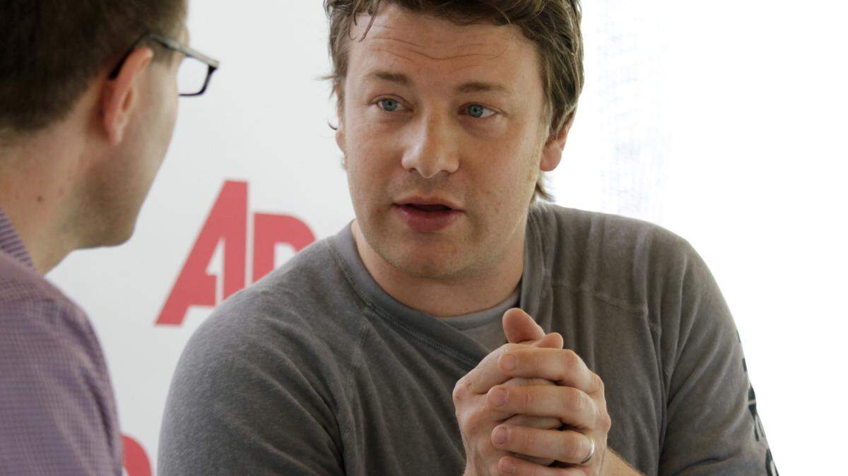 FILE 
 A Coast woman wants celebrity chef Jamie Oliver, right, to come to Mississippi to teach people in the state to eat healtheir. (AP Photo/J Pat Carter, File)