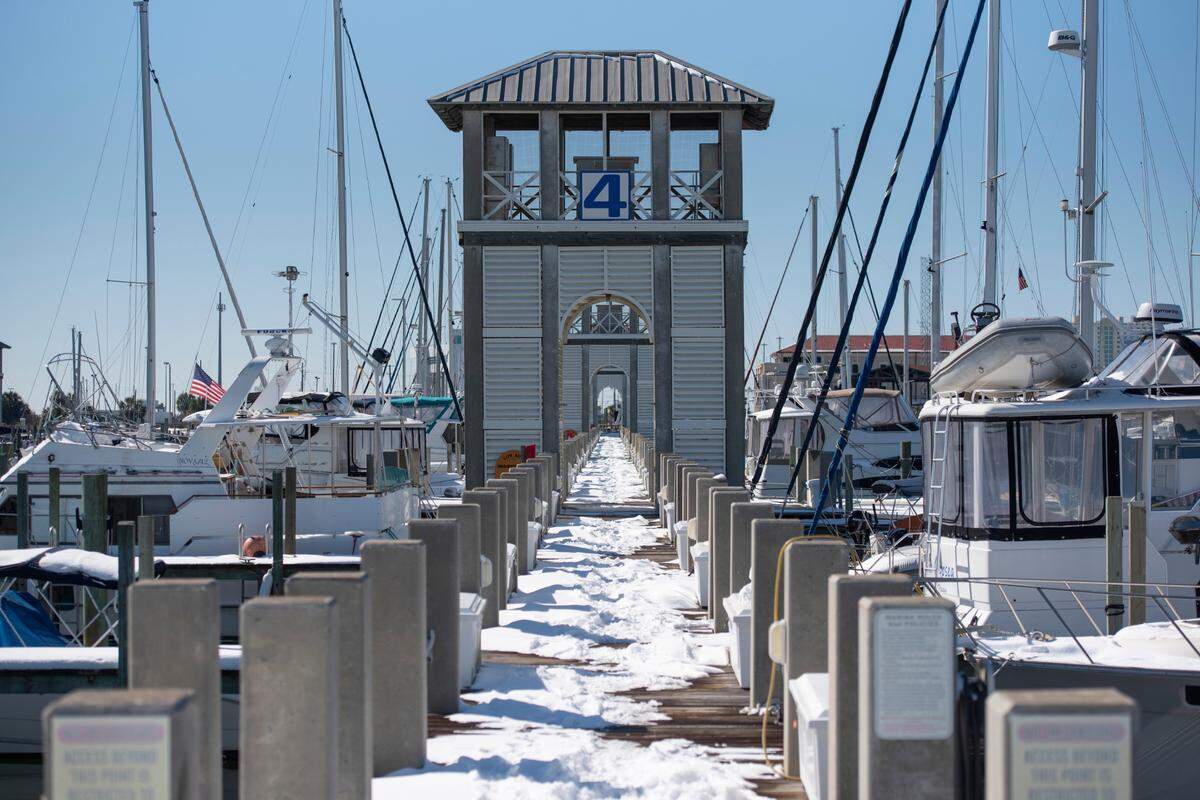 Snow and boats are an unusual combination in South Mississippi.