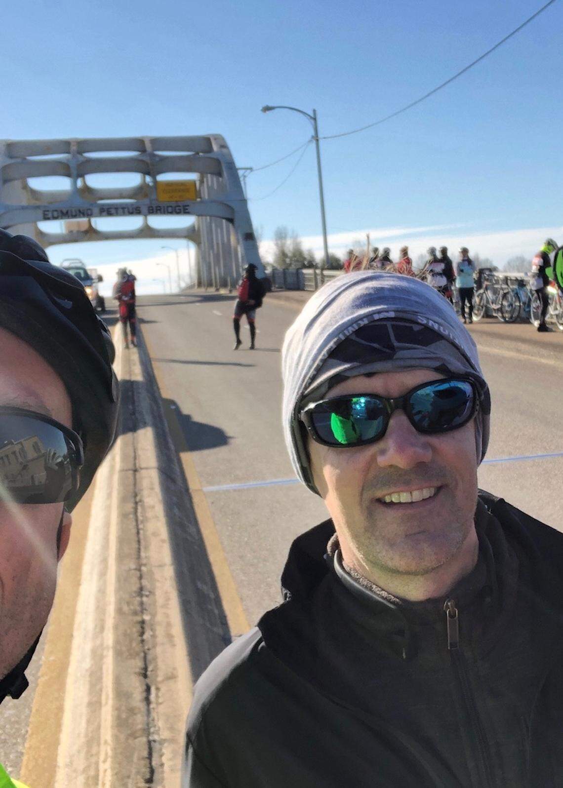 State Health Officer Thomas Dobbs is disciplined about exercise and enjoys cycling. He is pictured on the Edmund Pettus Bridge in Selma, Alabama, for a 51-mile relay in 2019.