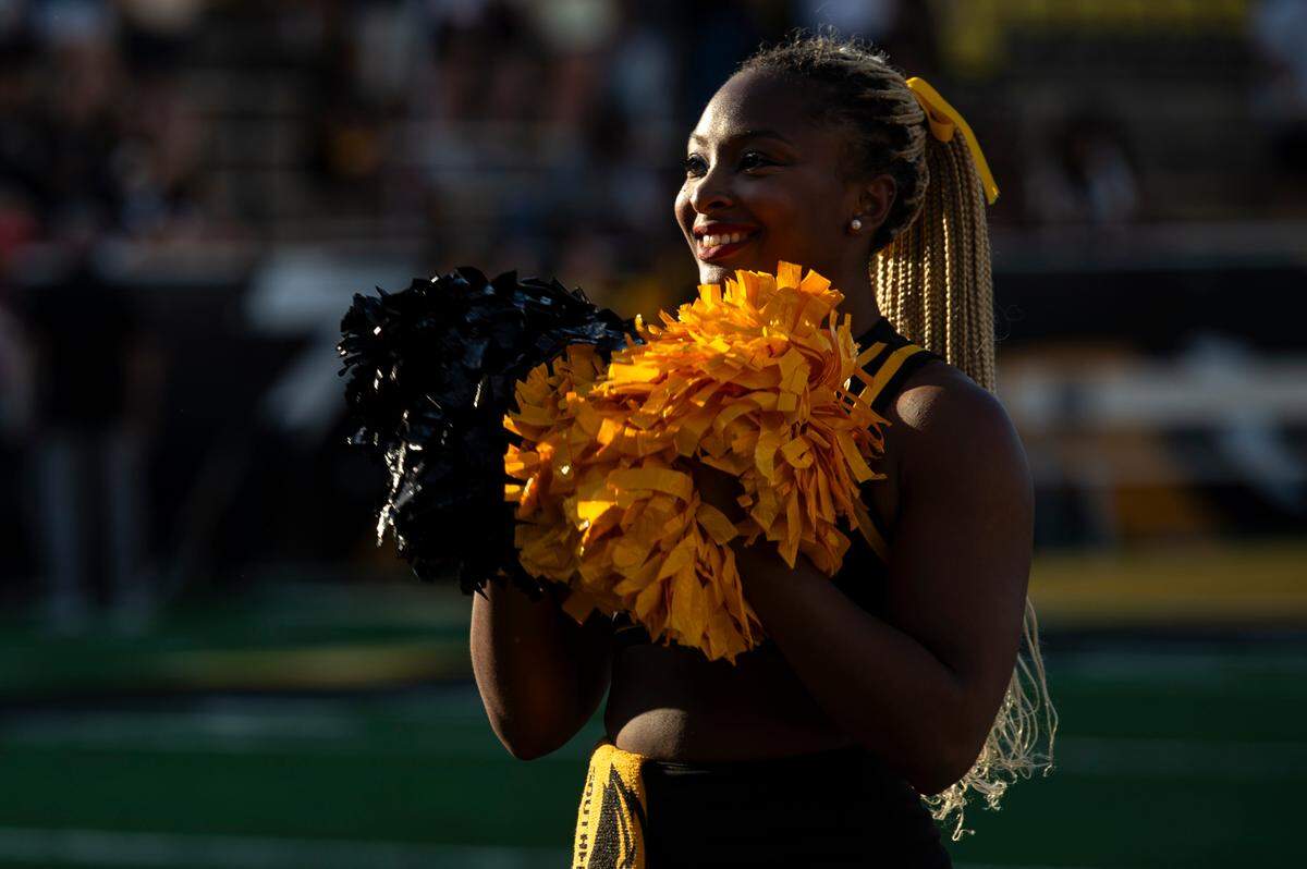 A Southern Miss cheerleader performs before a game between Southern Miss and Southeastern Louisiana at M.M. Roberts Stadium in Hattiesburg on Saturday, Sept. 7, 2024.