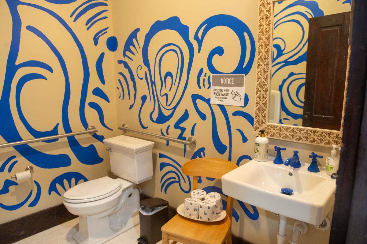 Bathrooms at The Traveler, a new extension to the Walter Anderson Museum of Art in Ocean Springs, are decorated in the spirit of Walter Anderson.