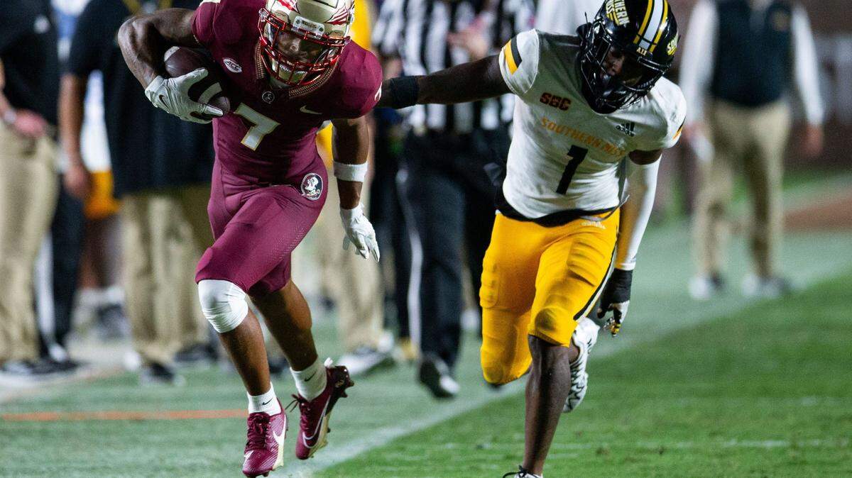 Florida State Seminoles wide receiver Destyn Hill (7) is pushed out of bounds by a defender. The Florida State Seminoles defeated the Southern Miss Golden Eagles on Saturday, Sept. 9, 2023.