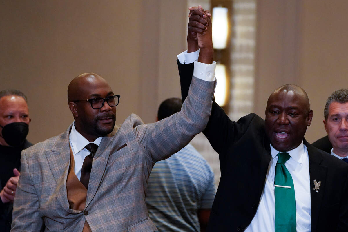 Philonise Floyd, left, and Attorney Ben Crump react after a guilty verdict was announced at the trial of former Minneapolis police Officer Derek Chauvin for the 2020 death of George Floyd, Tuesday, April 20, 2021, in Minneapolis.