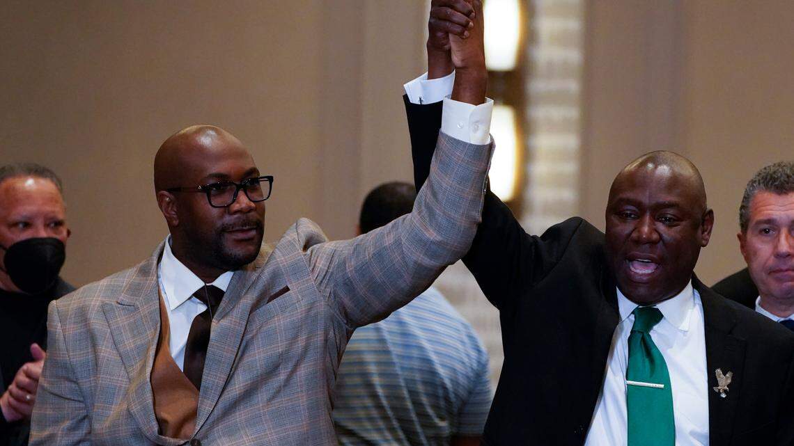 Philonise Floyd and Attorney Ben Crump, from left, react after a guilty verdict was announced at the trial of former Minneapolis police Officer Derek Chauvin for the 2020 death of George Floyd, Tuesday, April 20, 2021, in Minneapolis, Minn. Former Minneapolis police Officer Derek Chauvin has been convicted of murder and manslaughter in the death of Floyd. (AP Photo/Julio Cortez)