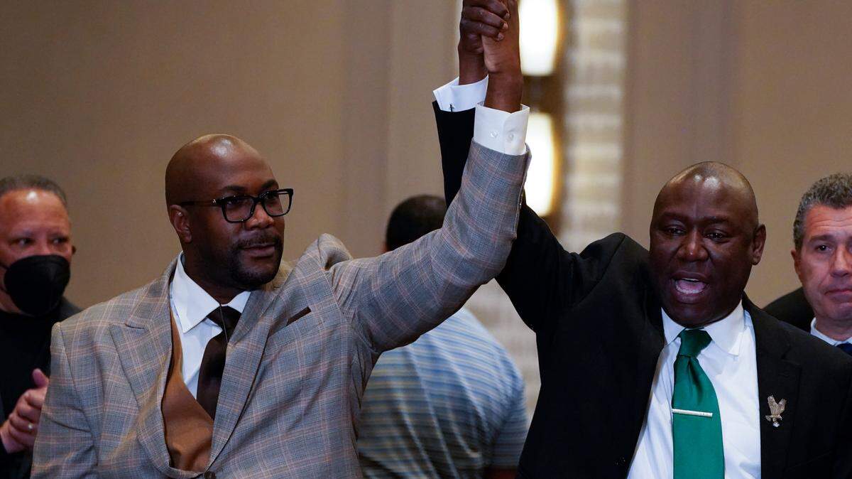 Philonise Floyd and Attorney Ben Crump, from left, react after a guilty verdict was announced at the trial of former Minneapolis police Officer Derek Chauvin for the 2020 death of George Floyd, Tuesday, April 20, 2021, in Minneapolis, Minn. Former Minneapolis police Officer Derek Chauvin has been convicted of murder and manslaughter in the death of Floyd. (AP Photo/Julio Cortez)