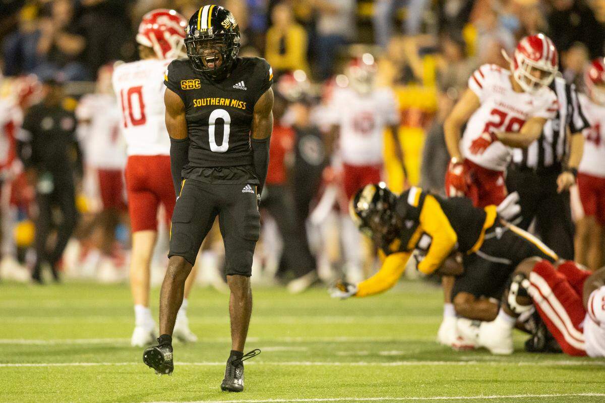 Southern Mississippi defensive back Natrone Brooks (0) celebrates after a play during the first half of an NCAA college football game against Louisiana in Hattiesburg, Miss., Thursday, Oct. 27, 2022. (Hannah Ruhoff/The Sun Herald via AP)