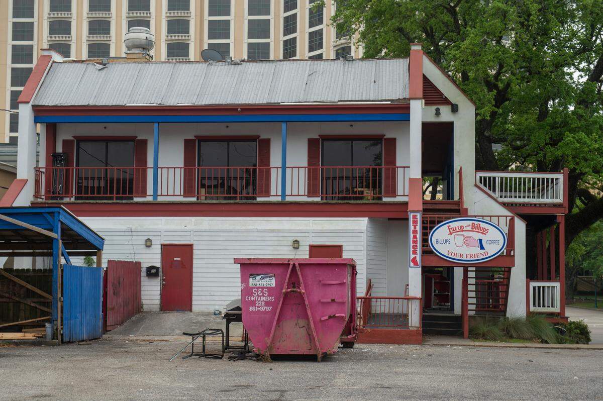 A dumpster sits behind the former Fill-up with Billups restaurant in Biloxi as the building is prepared to be remodeled into a new venture.
