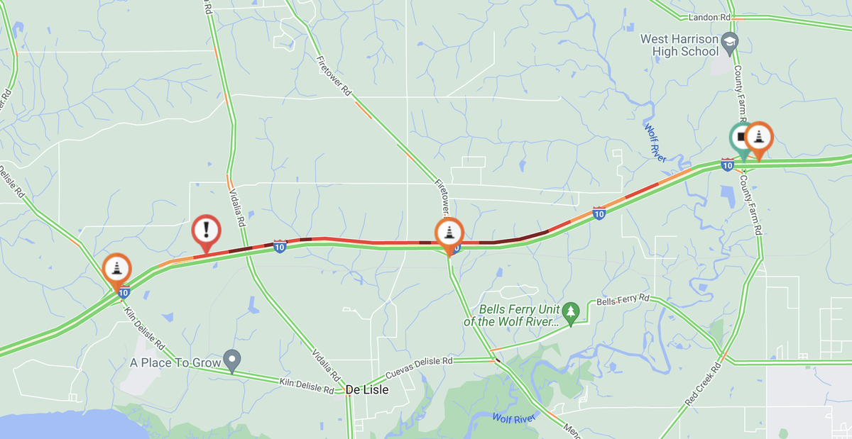 Traffic slogged in Harrison County on Friday after rain made Interstate 10 slick near Menge Avenue.