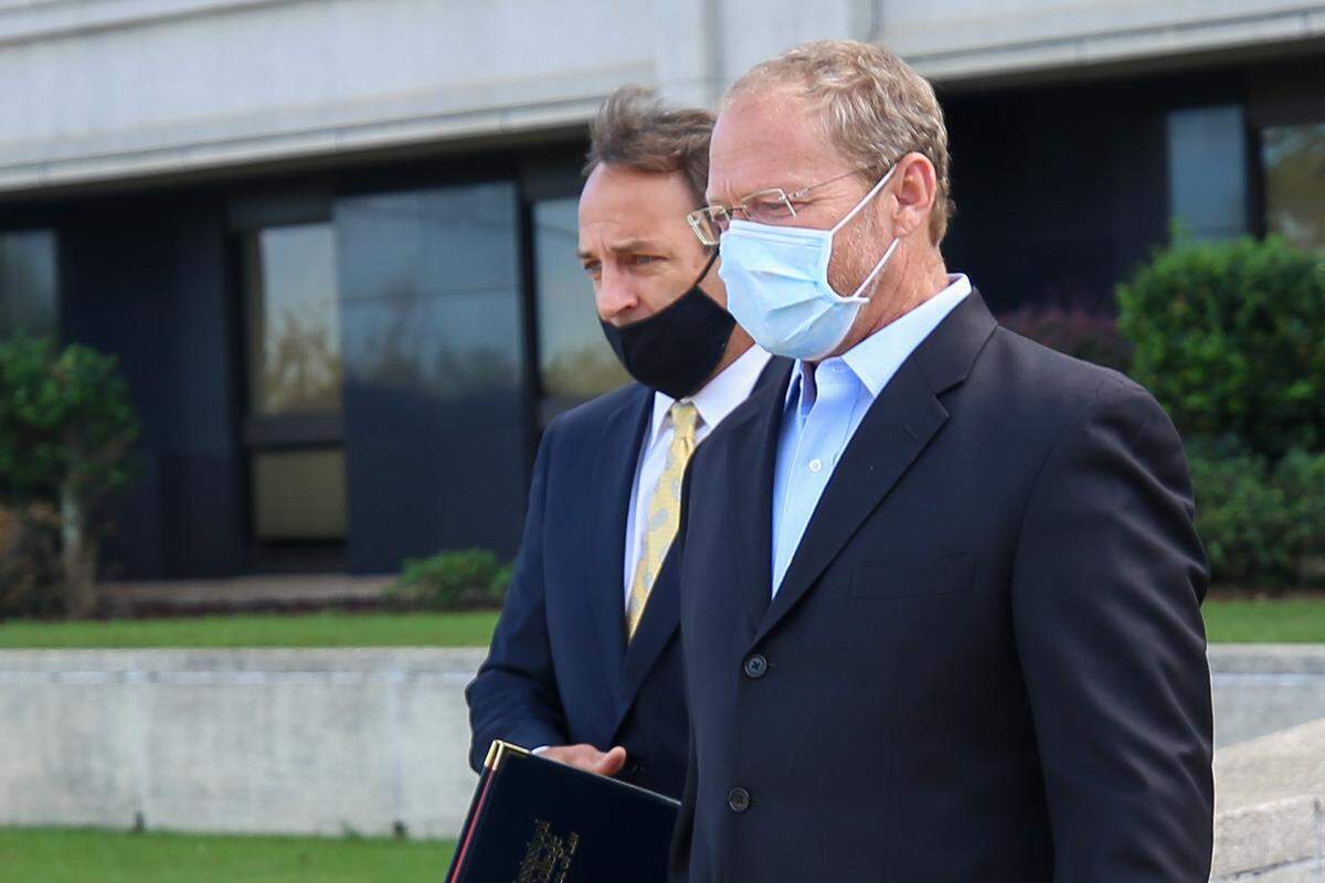 Ocean Springs businessman Dempsey Levi walks out federal court in Hattiesburg, Miss., after pleading guilty in TRICARE healthcare fraud scheme at Lovelace Drugs, Gardens Pharmacy on Mississippi Gulf Coast Wednesday, Oct. 14, 2020.