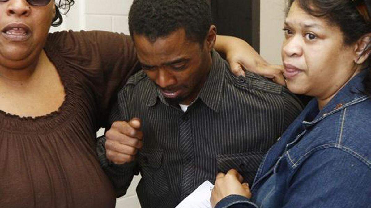ROGELIO V. SOLIS/ASSOCIATED PRESSAn emotional Joshua Blunt, center, is surrounded by family members after being released from the Grenada County Jail on Tuesday, May 24, 2016.