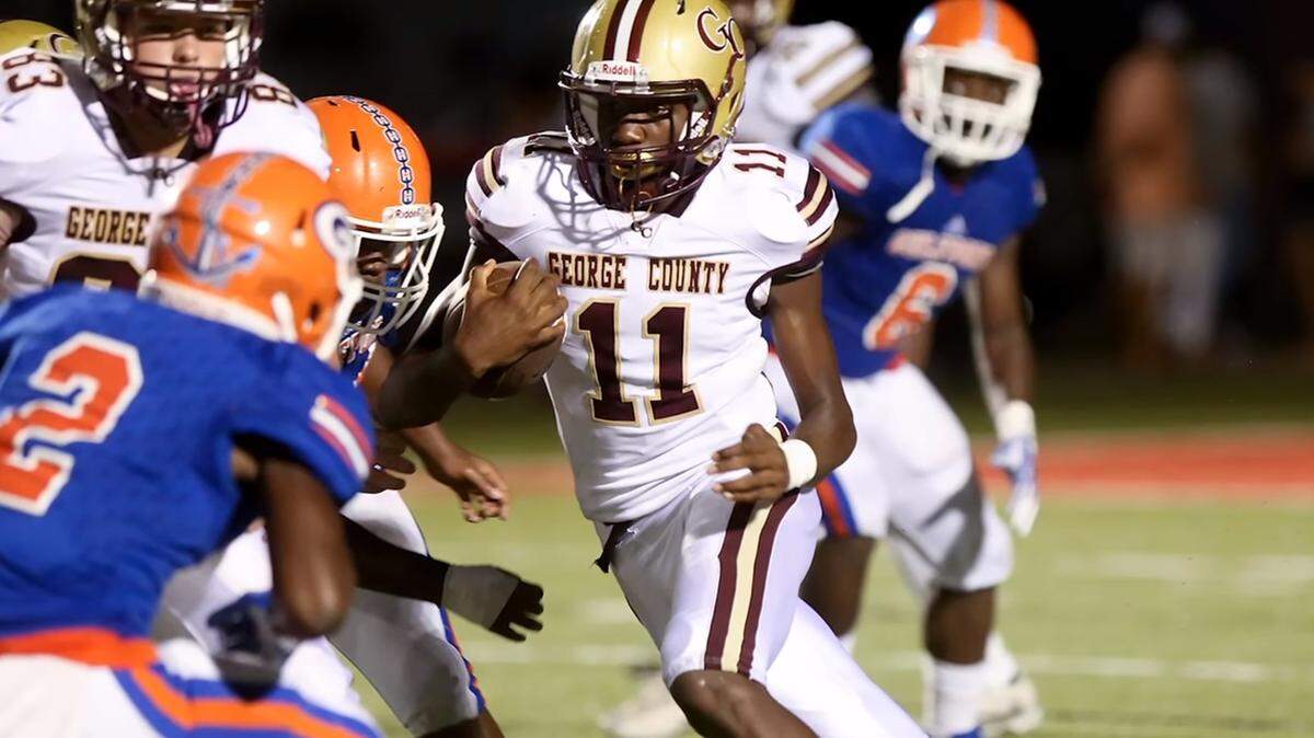 George County receiver M.J. Daniels looks for yardage during a game against Gulfport in Lyman on Aug. 17, 2018.