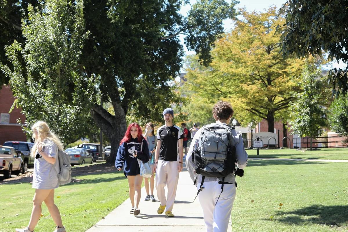 Mississippi State University students walk to class on the Starkville campus.