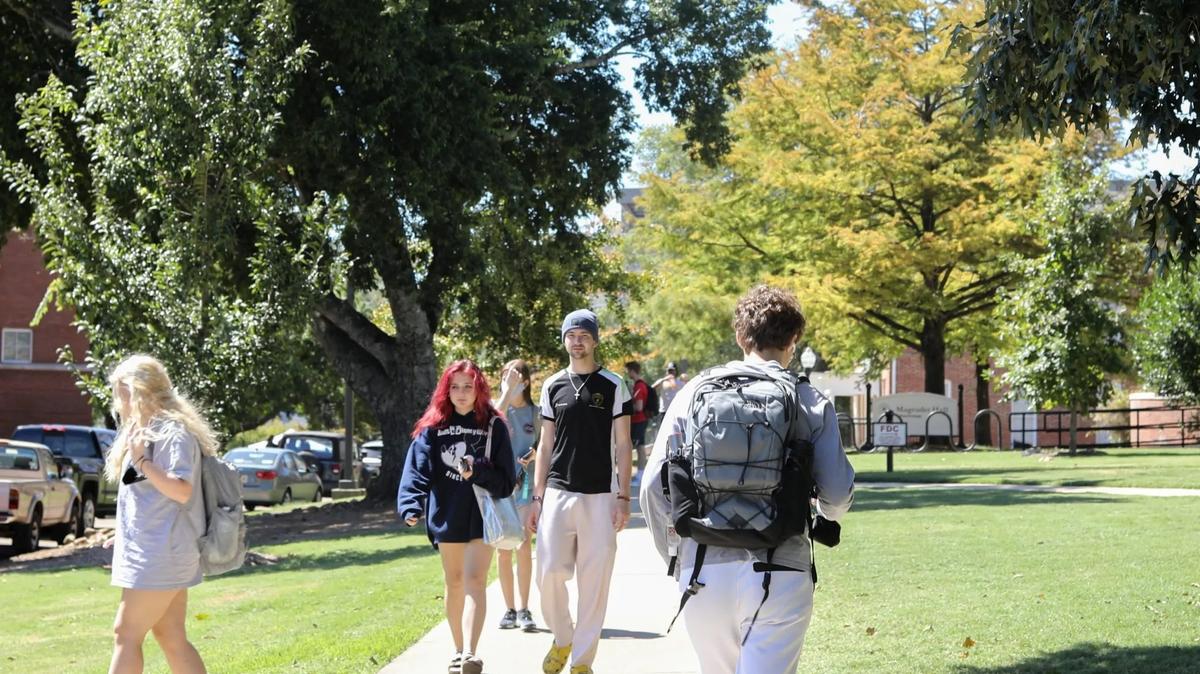 Mississippi State University students walk to class on the Starkville campus.
