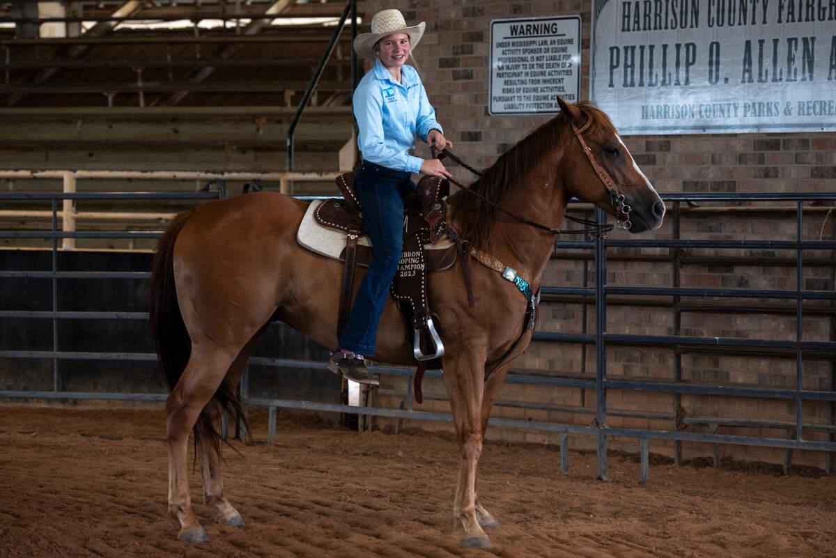 Kinsley McBride rides her horse Jet for practice at the Harrison County Fairgrounds on Thursday, June 13, 2024.