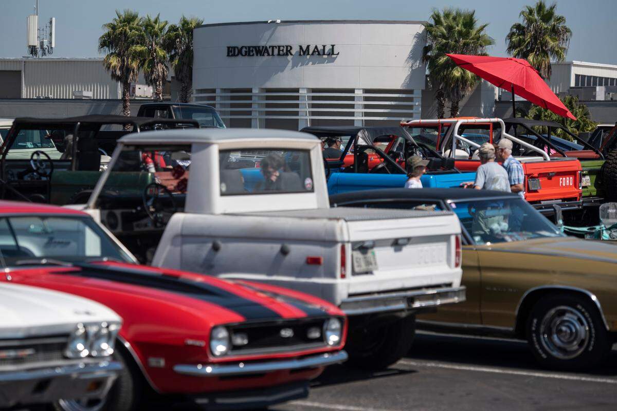A parking lot adjacent to Edgewater Mall in Biloxi is lined with classic cars during Cruisin’ 2022.