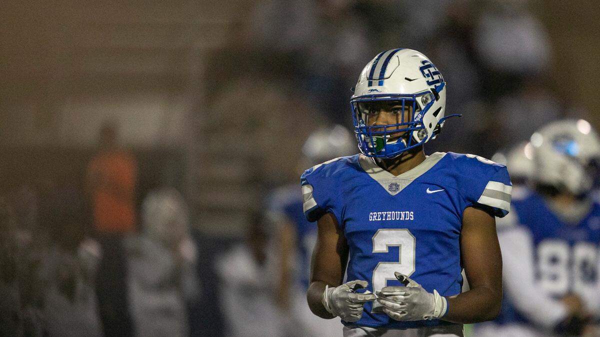 Ocean Springs’ Trace Carter in between plays at Greyhound Stadium in Ocean Springs on Friday, Nov. 12, 2021.