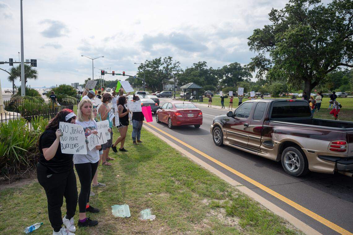 Coast residents joined nationwide protests over the death of George Floyd in Minneapolis by demonstrating in front of the Biloxi Lighthouse on U.S. 90 on Saturday, May 30, 2020. The first sign reads, “No justice, No peace, Black Lives Matter.”