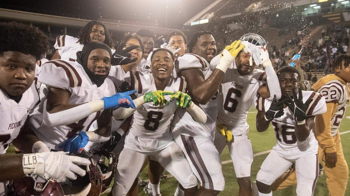 Picayune players celebrate after winning the 5A State Championship at M.M. Roberts Stadium in Hattiesburg on Friday, Dec. 2, 2022.
