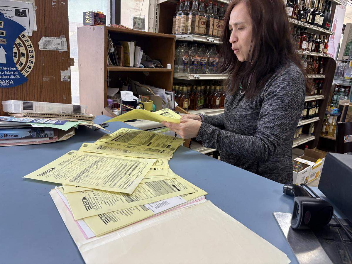 Nu Tran, owner of Soloman’s Wine & Liquors in Biloxi, has not joined three other businesses suing the operator of the state wine and liquor warehouse, Ruan Transport Corp., but she is frustrated by slow deliveries. Tran was looking over shipment orders, including one for 12 cases of liquor she ordered and paid for in February but hasn’t received.